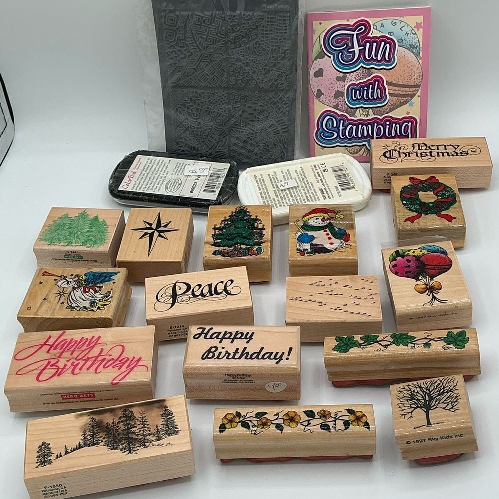 19 Assorted Rubber Stamps Set with inks and book, most are new.